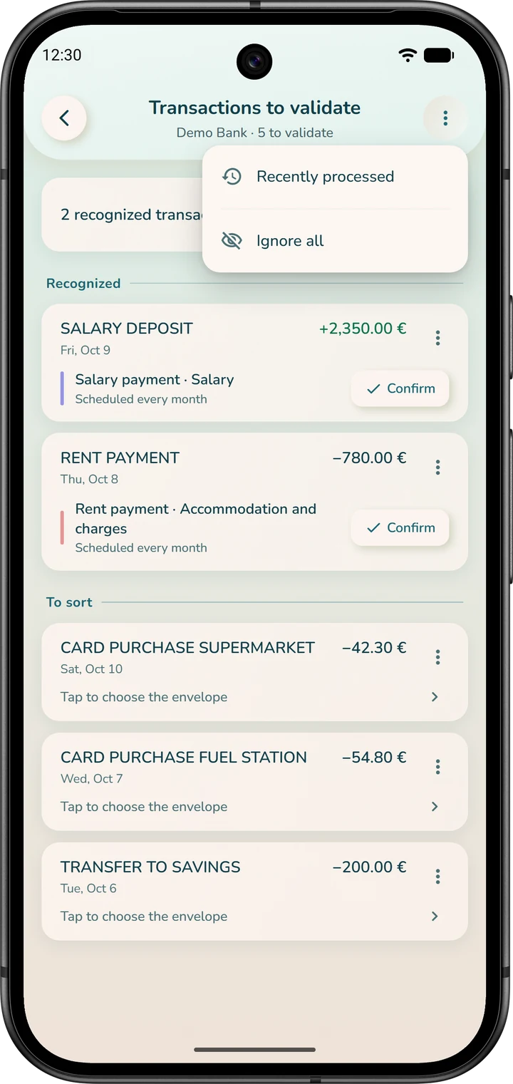The “Transactions to validate” list: bank transactions sorted into recognized ones and ones to sort, and the page menu with “Recently processed” and “Ignore all”.